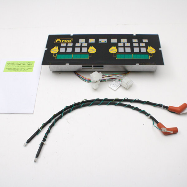 A black electronic device with a black and green wiring kit.