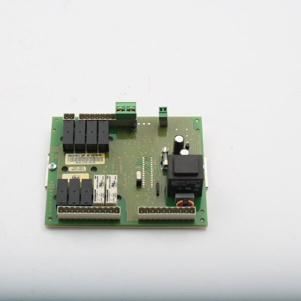 A green circuit board for a Rational 3040.3100ET Level Control Pcb with black and white components.