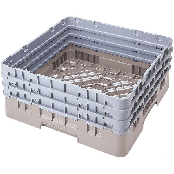A stack of Cambro beige plastic dish racks with closed sides and extenders.