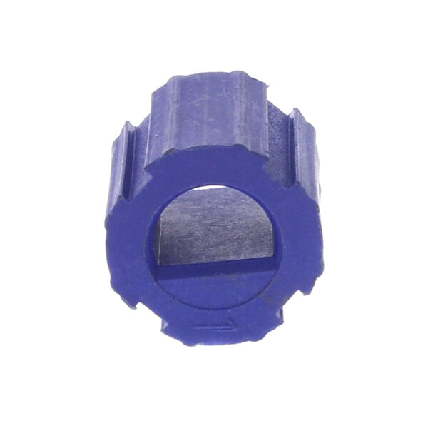 A blue plastic cylinder with a hole.