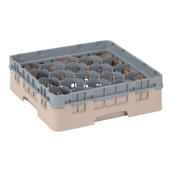 A beige plastic Cambro glass rack with compartments and an extender.