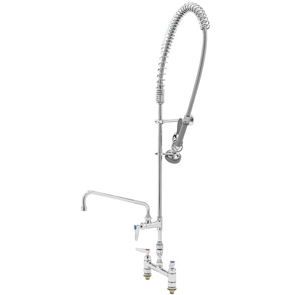 A chrome T&S pre-rinse faucet with a hose and a sprayer.