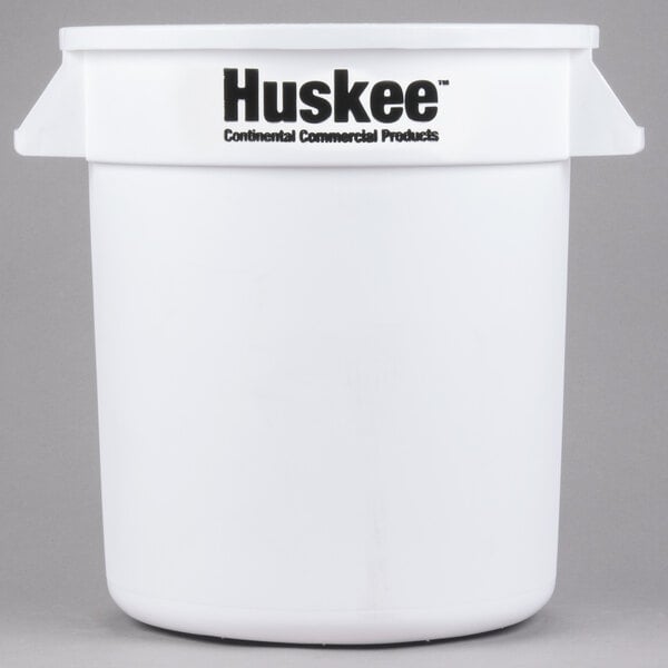 A white Continental round trash can with black text that reads "Huskee 10 Gallon"
