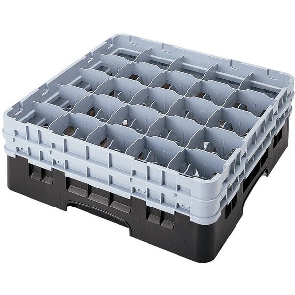 A black plastic Cambro glass rack with compartments and extenders.
