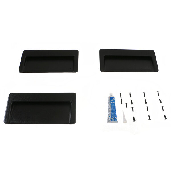 A black rectangular True Refrigeration door handle kit with screws and glue.