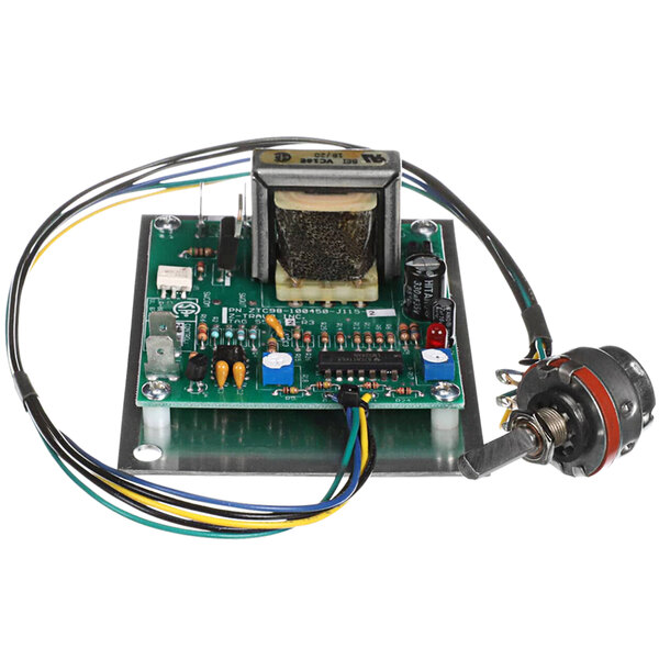 The Crown Steam temperature control power supply board with wires and a small circuit board.