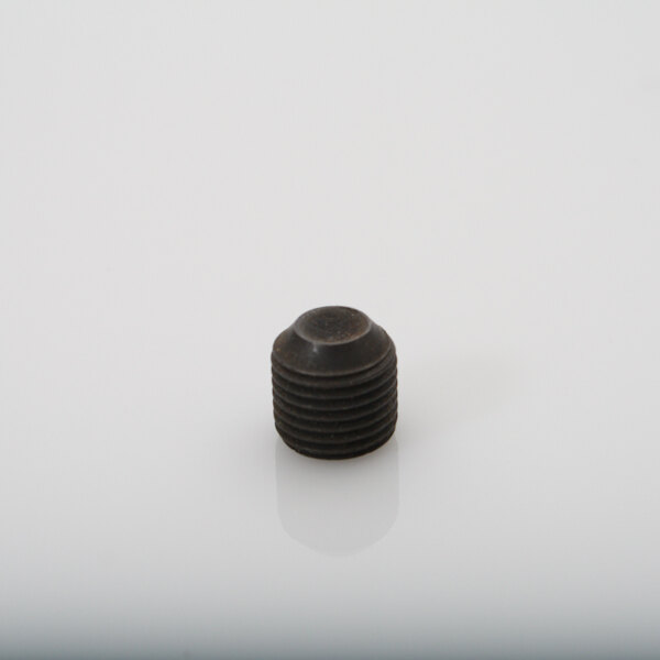 A close-up of a Blakeslee black metal set screw on a white surface.