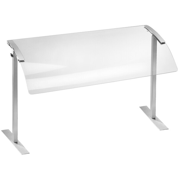 A clear acrylic sneeze guard with stainless steel legs on a counter.