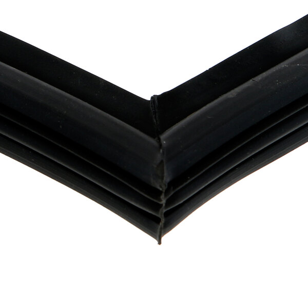 A close up of a black rubber seal with a black border.