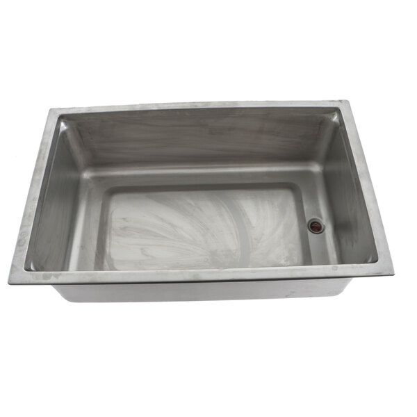 A stainless steel countertop pan with a drain.