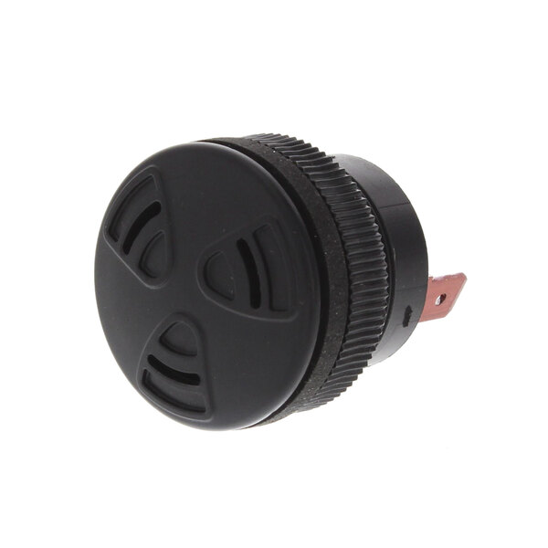 A black plastic Accutemp piezo alarm button with a black circle and metal strip.