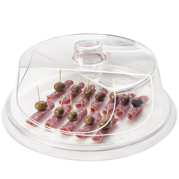 A Cal-Mil clear plastic tray cover with food on it.
