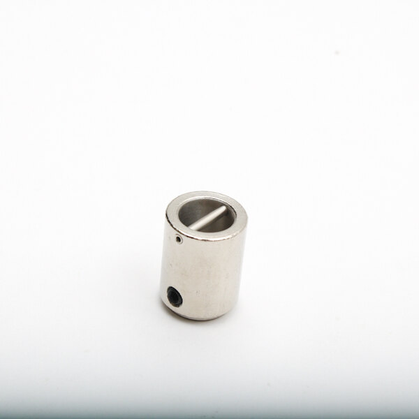 A metal cylinder with a metal object with holes on the end.