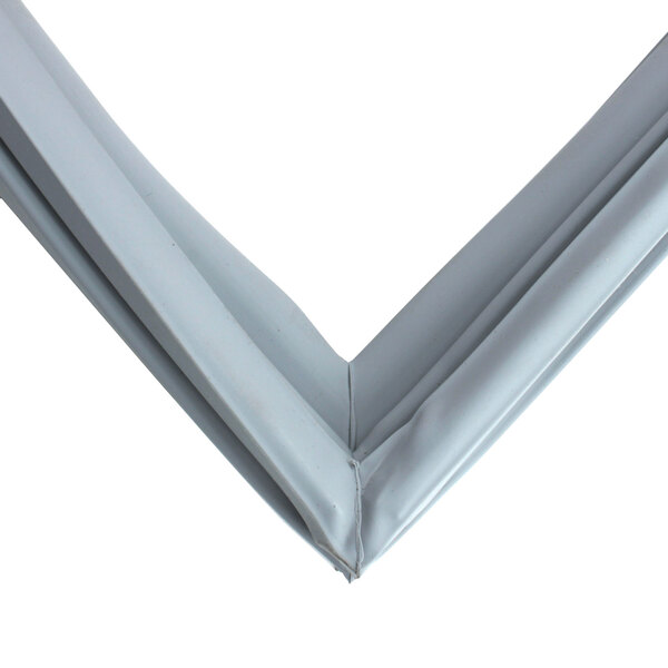 A close-up of a gray metal corner of a Perlick door gasket.