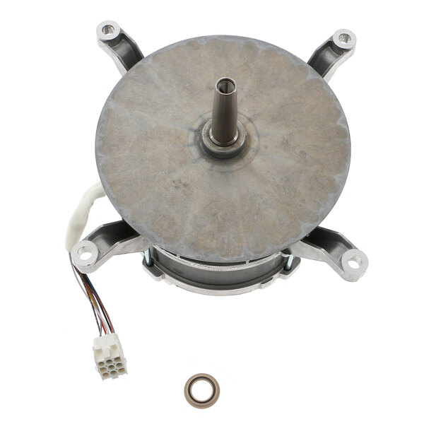 A Henny Penny Classic fan motor with a circular metal object and wires.