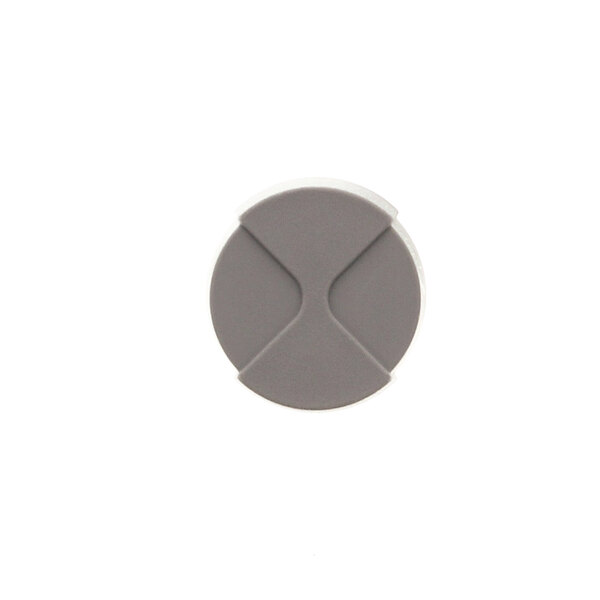 A grey circular knob with a cross on it.