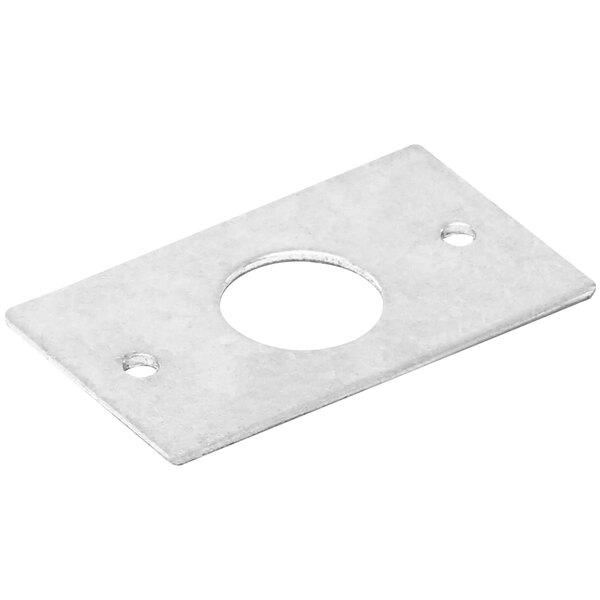 A silver rectangular metal plate with a hole in the center.