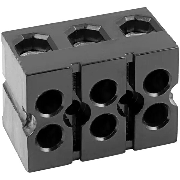 A black Bakers Pride terminal block with holes.