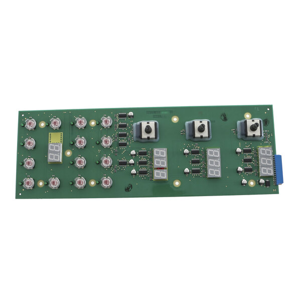 An Eloma E742465 control board with green circuitry, buttons, and switches.