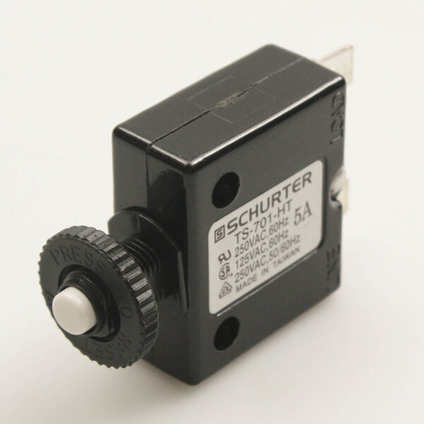 A black plastic device with a white label.