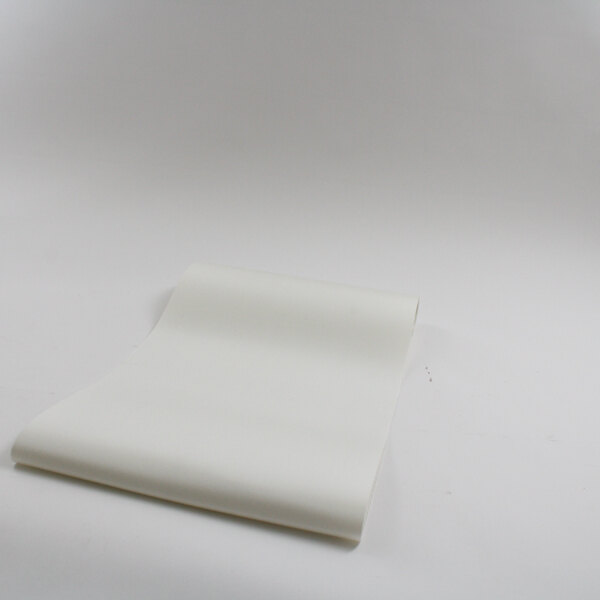 A white paper on a white surface.