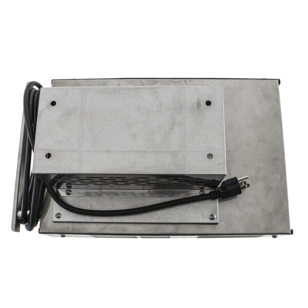 A Carter-Hoffmann metal box with a black power cord.