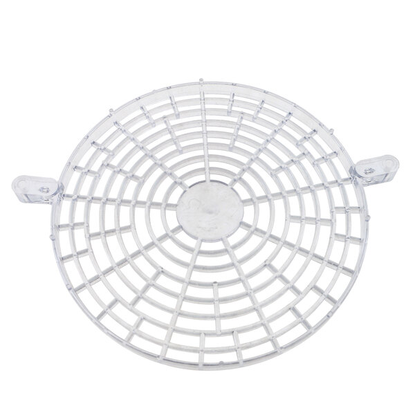 A white metal grid with a circular design.