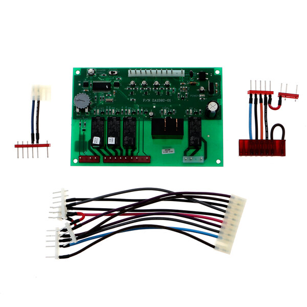 A green Hoshizaki DCM timer board with many wires and connectors.