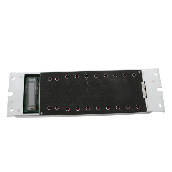 A white rectangular electronic board with a black rectangular object with red dots.