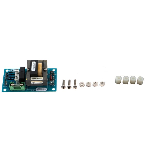 A blue circuit board with small screws and small round white plastic parts.