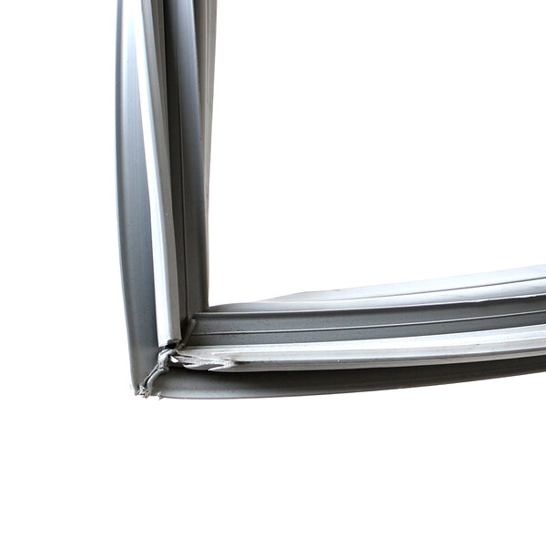 A close-up of a white metal Kolpak window frame.