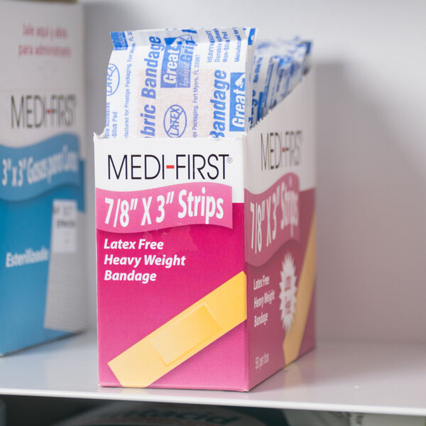 A box of Medique woven bandage strips on a shelf.