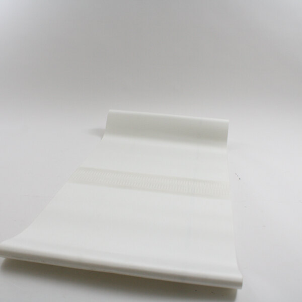 A white plastic sheet on a white surface.