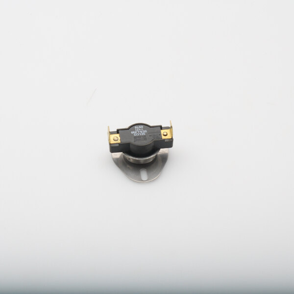 A small black and gold electrical device.
