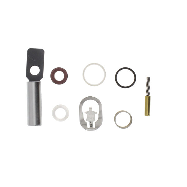 A group of metal parts on a white background including a black circle with a white center and a brown circle with a white center.