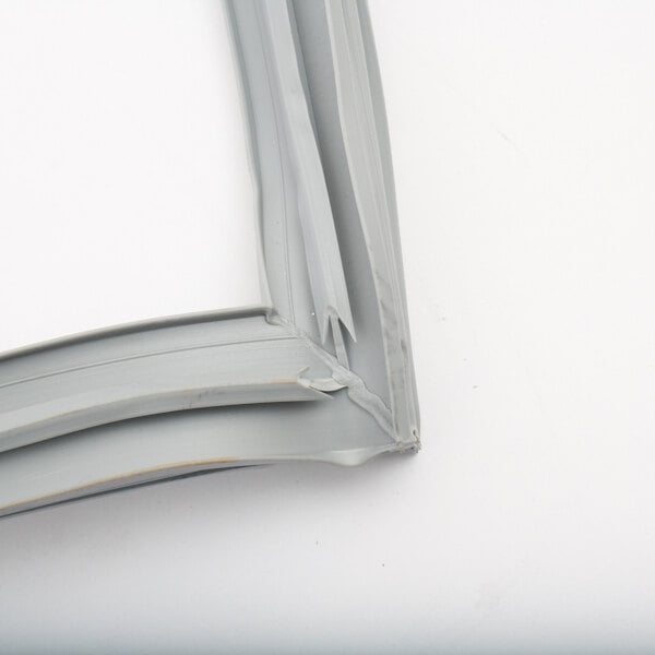A close-up of a white metal Thermo-Kool gasket frame.