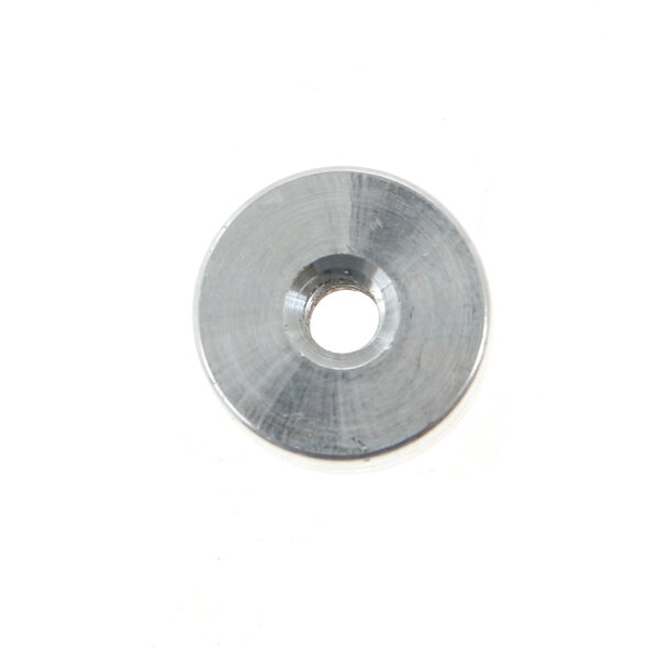 A close-up of a Randell HD knob, a round metal object with a hole in the middle.