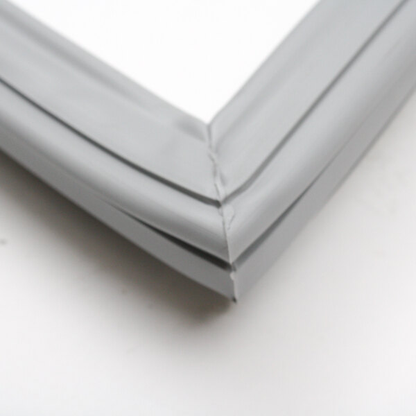 A close up of a grey plastic frame with white edges.