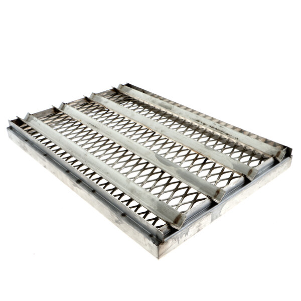 A metal grate with holes for a Bakers Pride charbroiler.