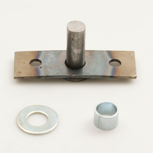 A Montague door pin with a metal ring and a washer on a metal surface.