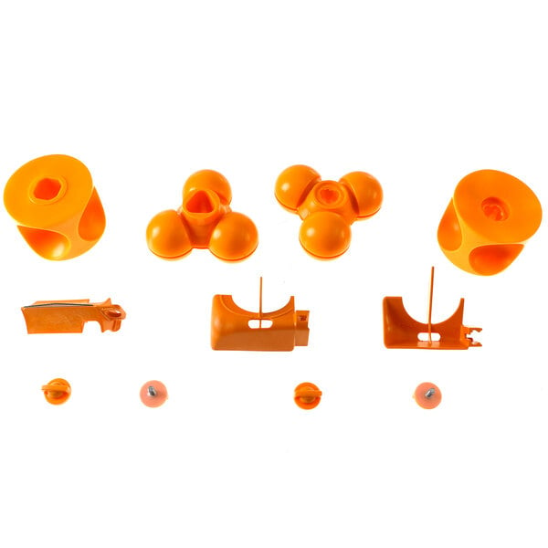 An orange plastic Zumex Speed Pro juicer kit with holes.