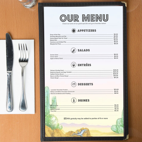 Menu paper with a Southwest themed lizard design on a table with a fork and knife.