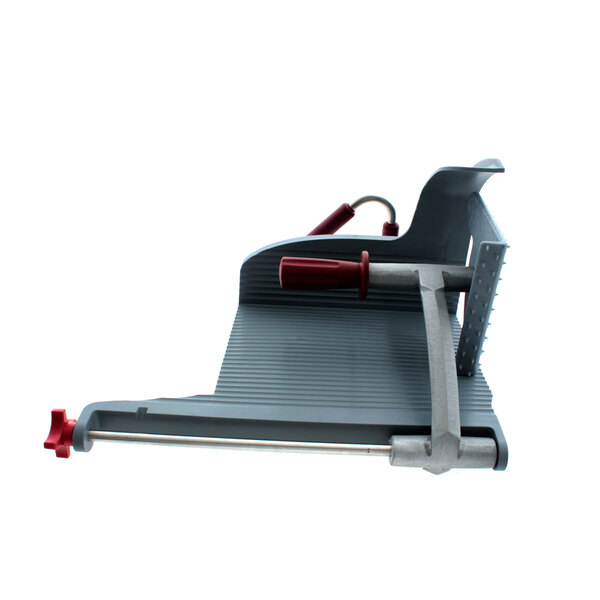 A grey and red Berkel meat slicer with red handles.