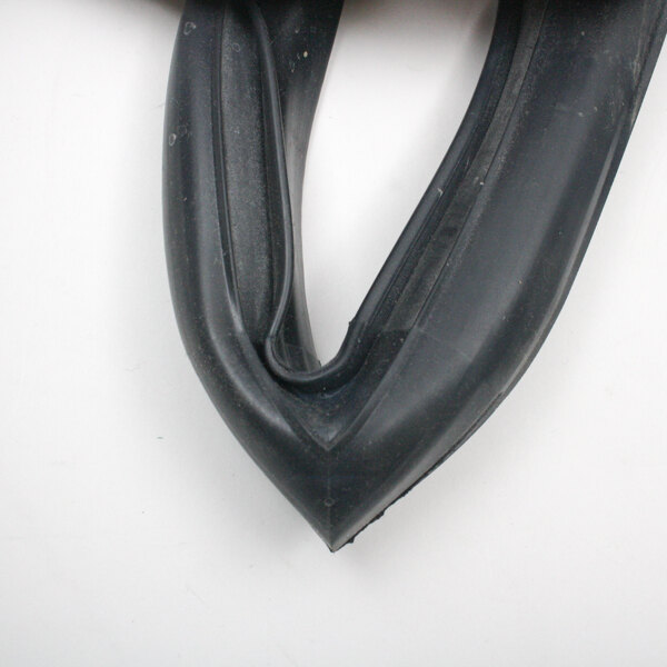 A black rubber gasket with a curved shape.