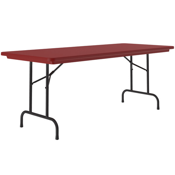 A red rectangular Correll R-Series plastic folding table with black legs.