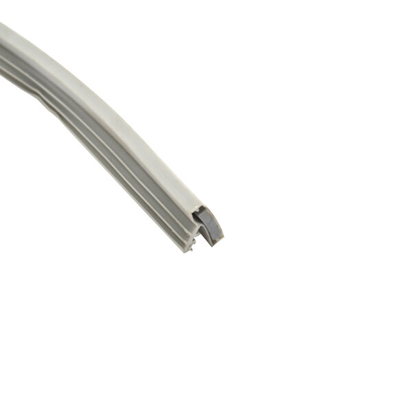 A close-up of a grey plastic strip with a silver connector.