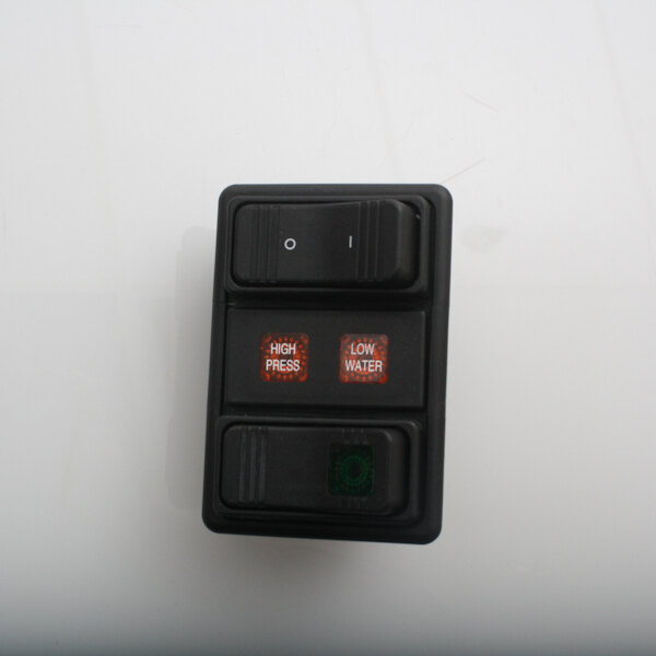 A black rectangular Vulcan switch with green buttons.