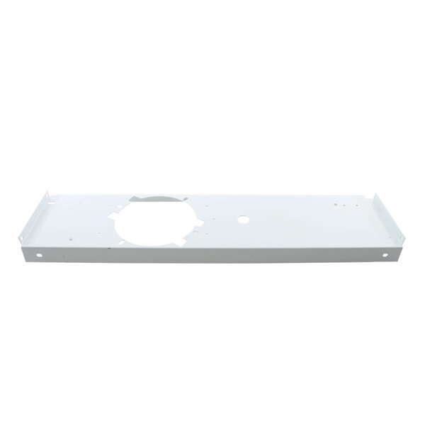 A white rectangular plastic fan guard with holes in it.