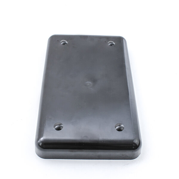 A black rectangular plastic piece with holes in it.