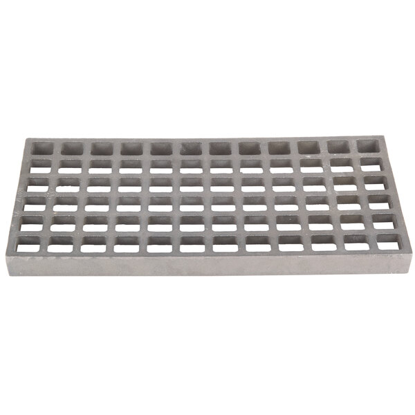 A grey metal rectangular grate with holes.